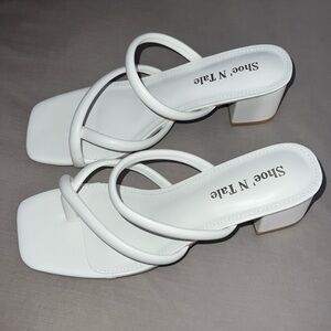 low heeled white shoes. perfect for any occasion.